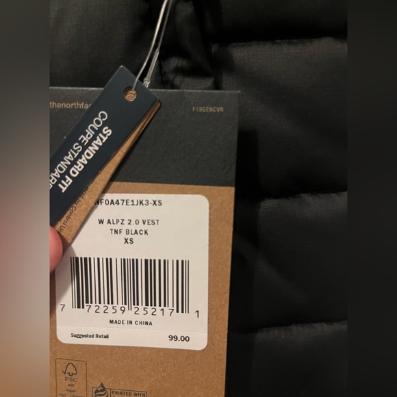 Black North face vest, New with tags. - Picture 2 of 3